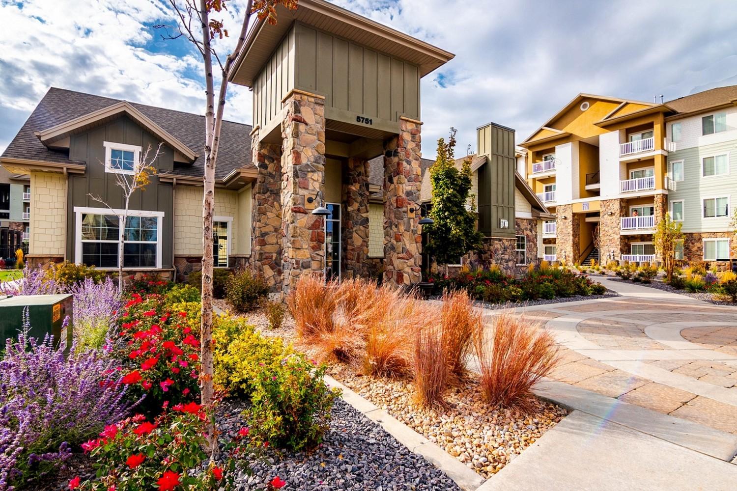 Leasing office exterior with landscaping