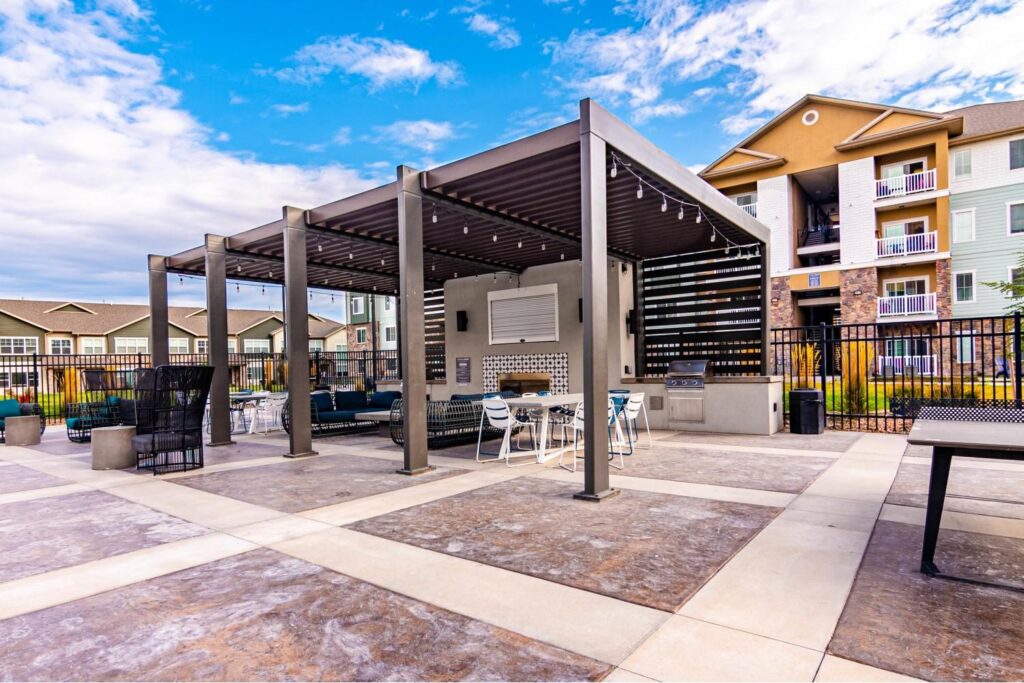 Poolside pavilion with grill and fireplace