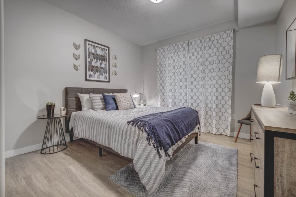 Bedroom with a large windows